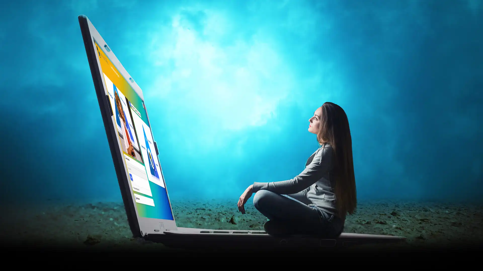 woman siting in front of an oversized laptop showing one of GlobalMeet's live webcasting events